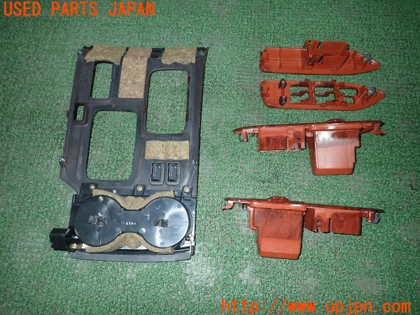 3UPJ=9229900645]ランクル100(UZJ100W)前期 純正  シフトパネル ウィンドウスイッチパネル インテリアパネル 内装パネル 木目調 中古_3