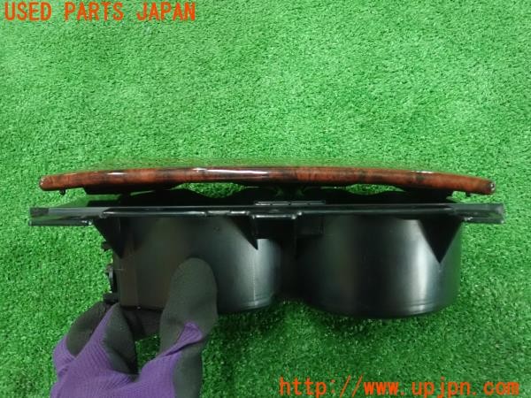 3UPJ=9231780631]ランクル100系(UZJ100W)前期 純正 木目調 ドリンクホルダー 中古_5