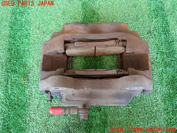 2UPJ-9231784085]ランクル100系(UZJ100W)左フロントキャリパー 中古_2