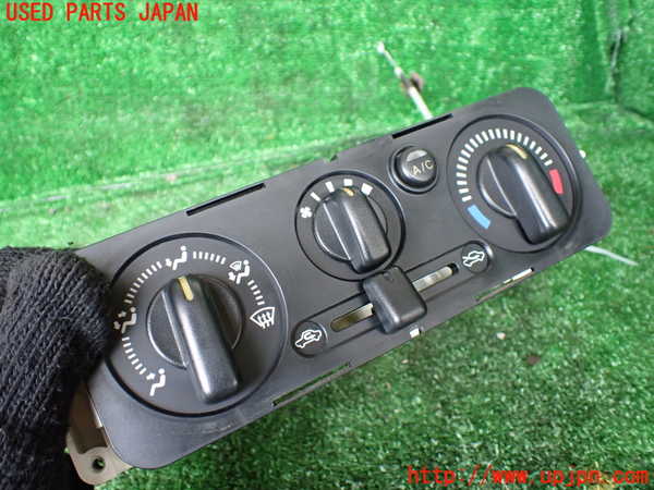 1UPJ-9232406066]ジムニー シエラ(JB43W)エアコンスイッチ1 中古_2