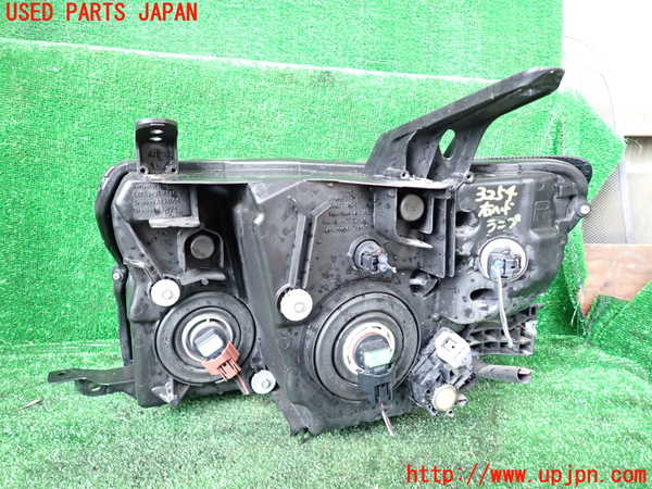 1UPJ-9232541130]パジェロ(V98W)右ヘッドライト ハロゲン 中古_3