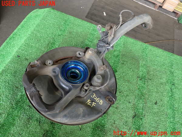 2UPJ-9232654295]ランクル100系(HDJ101K)左フロントナックルハブ 中古_2