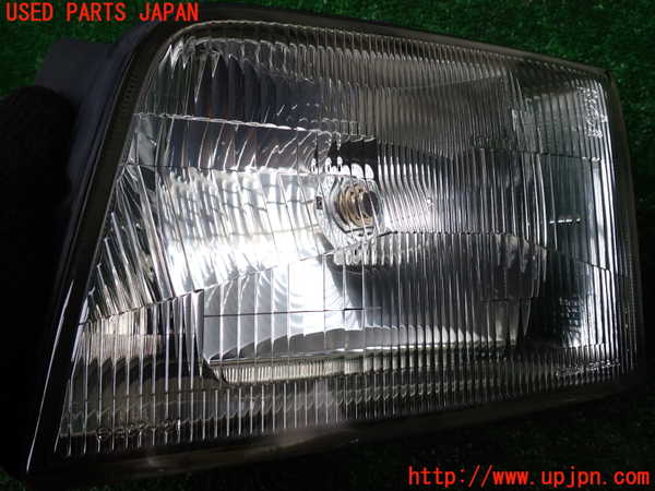 1UPJ-9233231132]ビッグホーン(UBS26GW)左ヘッドライト ハロゲン 中古_2