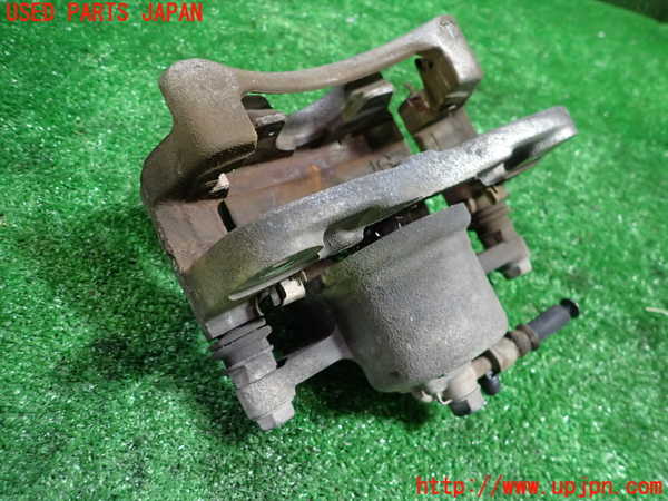 1UPJ-9233384085]カローラ アクシオ(NZE161)左フロントキャリパー 中古_2