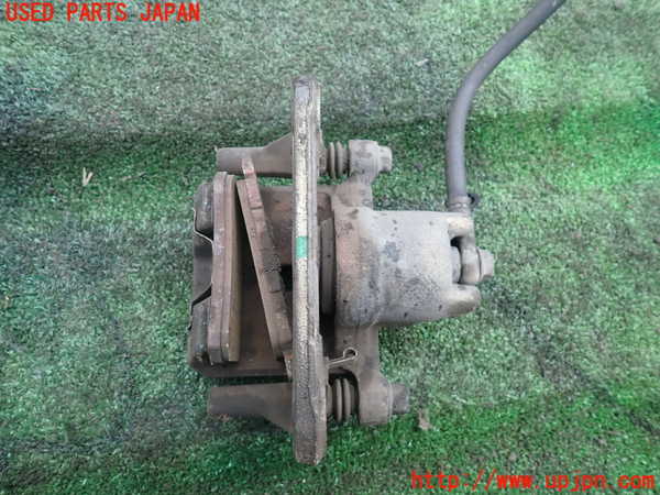 1UPJ-9234614090]パジェロ(V93W)右リアキャリパー 中古_2