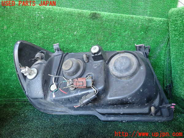 1UPJ-9234851132]ランクル100系(HDJ101K)左ヘッドライト ハロゲン 中古_3