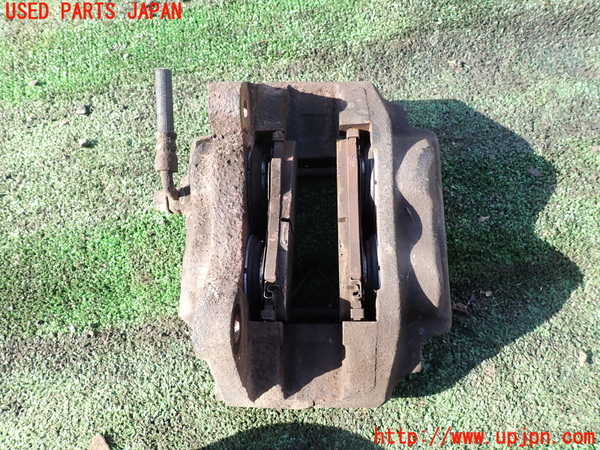 1UPJ-9234854085]ランクル100系(HDJ101K)左フロントキャリパー 中古_2