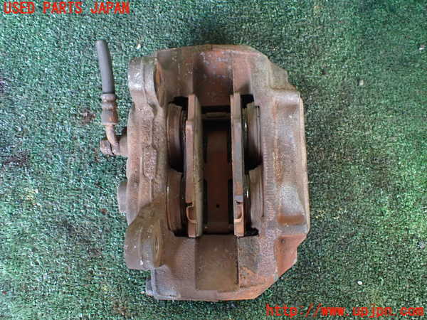 1UPJ-9236364085]ランクル80系(FZJ80G)左フロントキャリパー (ジャンク品) 中古_2