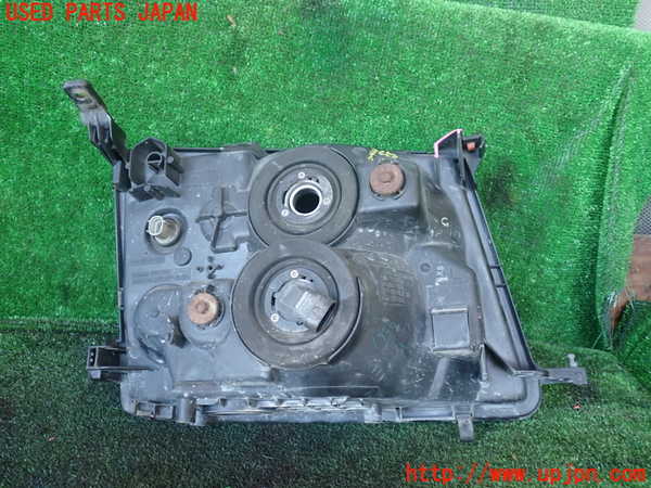 1UPJ-9236521132]ランクル100系(UZJ100W)左ヘッドライト ハロゲン 中古_2