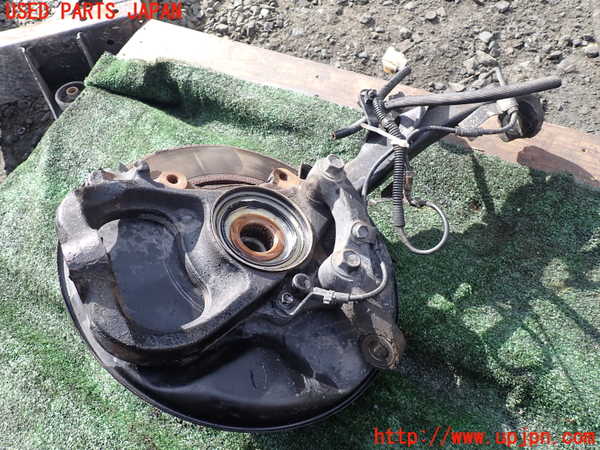 1UPJ-9236524295]ランクル100系(UZJ100W)左フロントナックルハブ 中古_2