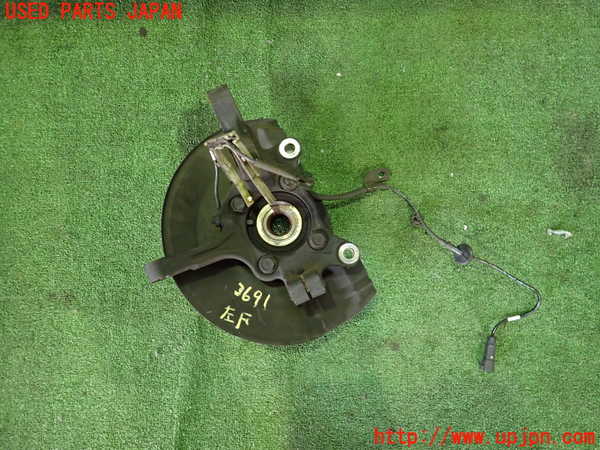 2UPJ-9236914295]ランエボ10(CZ4A)左フロントナックルハブ 中古_2