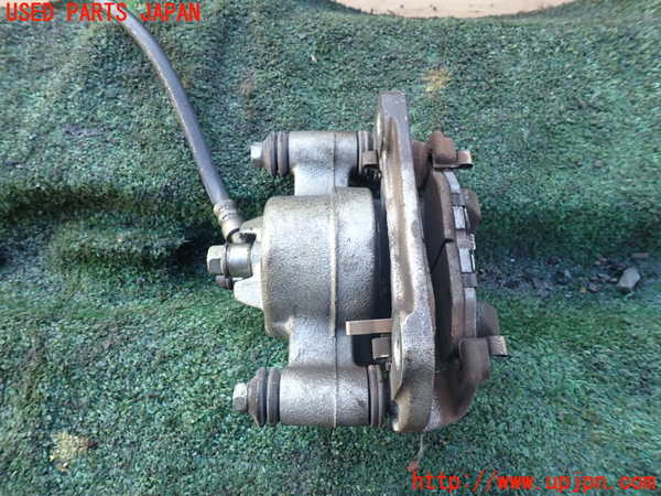 1UPJ-9237094085]ジムニー(JB64W)左フロントキャリパー 中古_2