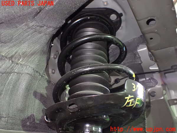 1UPJ-9237655025]カローラ ツーリング ハイブリッド(ZWE219W)左フロントストラット 中古_2