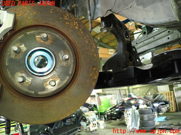 1UPJ-9238144295]セレナ(FNC28)左フロントナックルハブ 中古_3