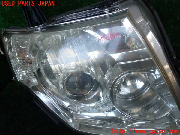 1UPJ-9238451130]パジェロ(V93W)右ヘッドライト HID 中古_2