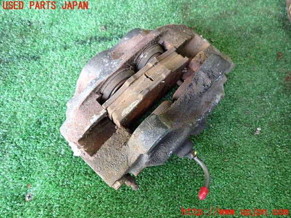 1UPJ-9238624085]ランクル60系(HJ61V(改))左フロントキャリパー 中古_2