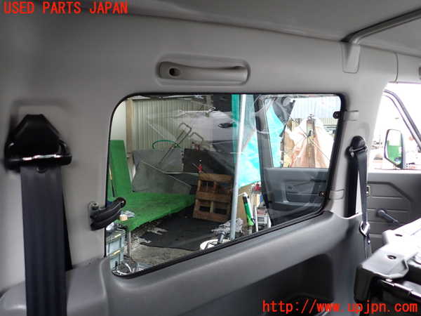 1UPJ-9239057680]ジムニー(JA22W)左リアピラートリム 中古_2