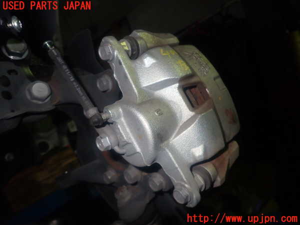 1UPJ-9240634085]カローラ ツーリング ハイブリッド(ZWE214W)左フロントキャリパー 中古_2