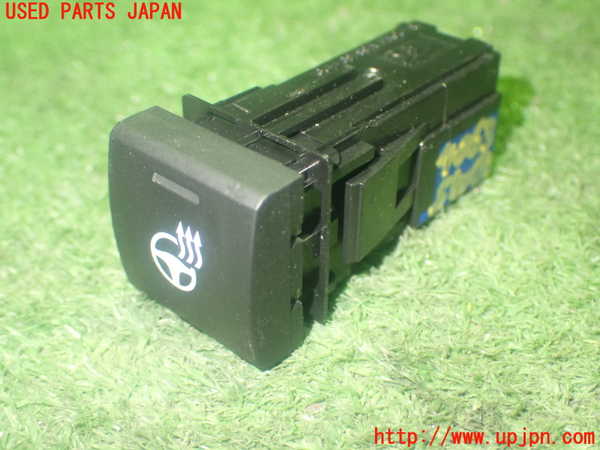 1UPJ-9240636306]カローラ ツーリング ハイブリッド(ZWE214W)スイッチ1 (ステアリングヒーター) 中古_2