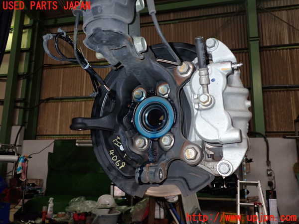 2UPJ-9240694295]日産リーフ(ZE1)左フロントナックルハブ 中古_2
